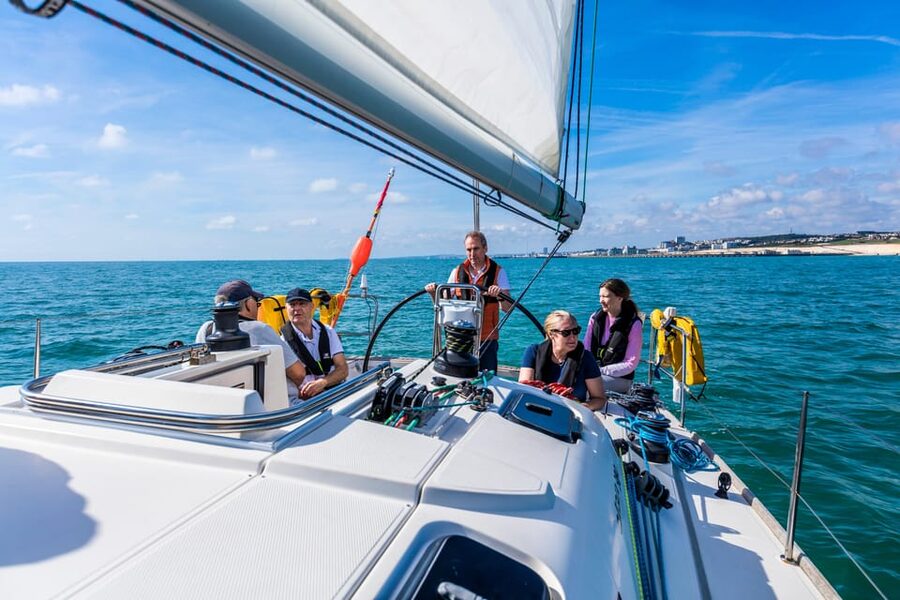 Brighton: Sailing Trip with Drinks - Taking the helm under an RYA-trained skipper