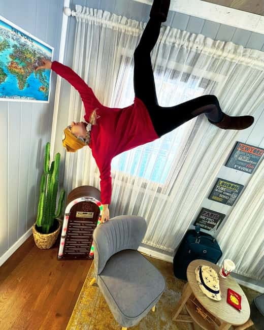 Brighton: Upside Down House Entry Ticket - The gaming area, jukebox, and ceiling bicycle