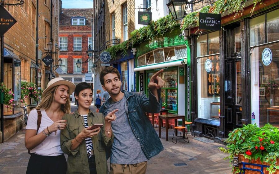 Cambridge: City Walking Tour & Exploration Game - The clock, secret society, and castle site