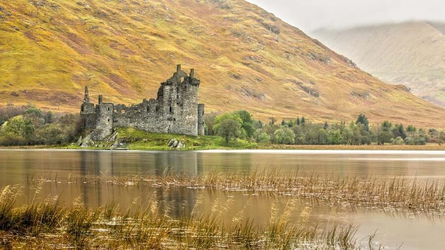 Edinburgh: Oban, Kilchurn Castle & Inveraray Tour in Spanish - Kilchurn Castle and the story of Clan Campbell