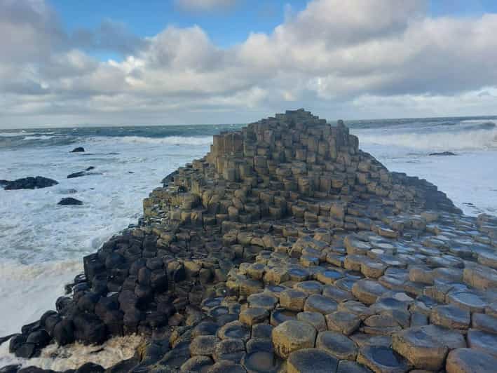 From Dublin: Giants Causeway Private Tour - Dunluce Castle from the coast road