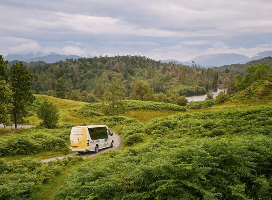 Liverpool: Lake District Tour with Lake Cruise & Train Ride - Windermere by boat, with the fells around you
