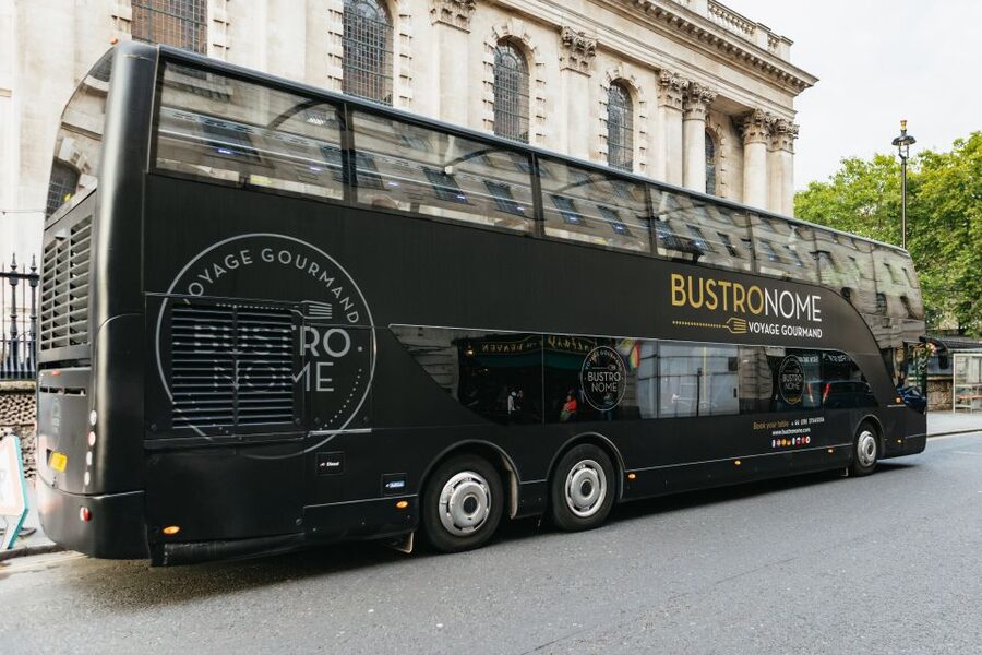 London: 6-Course Gourmet Dinner on a Luxury Coach - Daylight, darkness, and window reflections