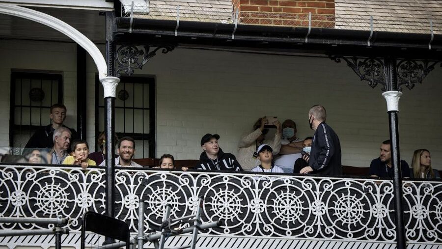 London: Craven Cottage Guided Tour at Fulham Football Club - Walking through a stand with real age