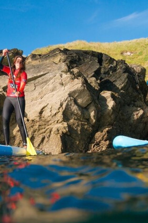 Newquay: Paddleboarding Lesson & Tour - Paddling between two Newquay coves
