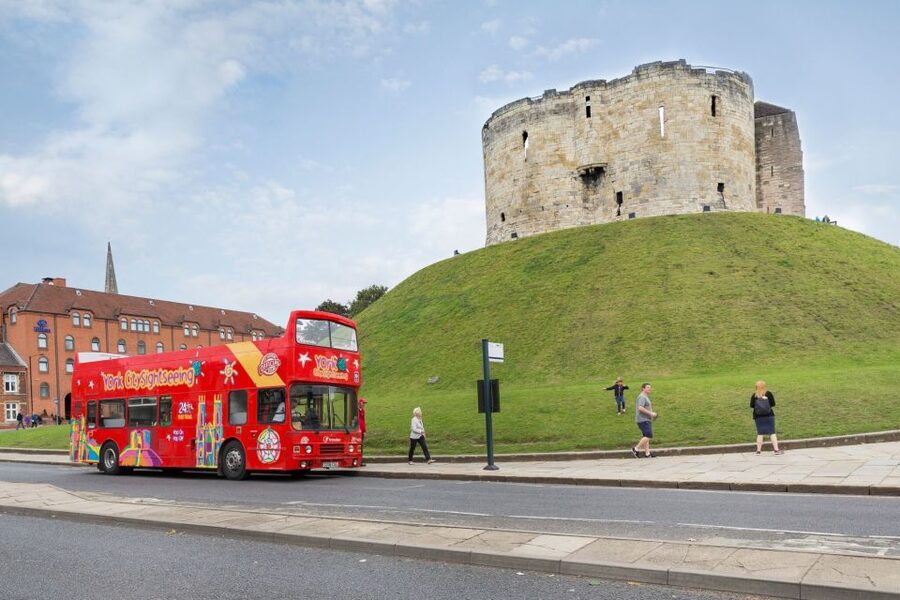York: City Sightseeing Hop-On Hop-Off Bus Tour - Gillygate and Monk Bar reveal medieval York